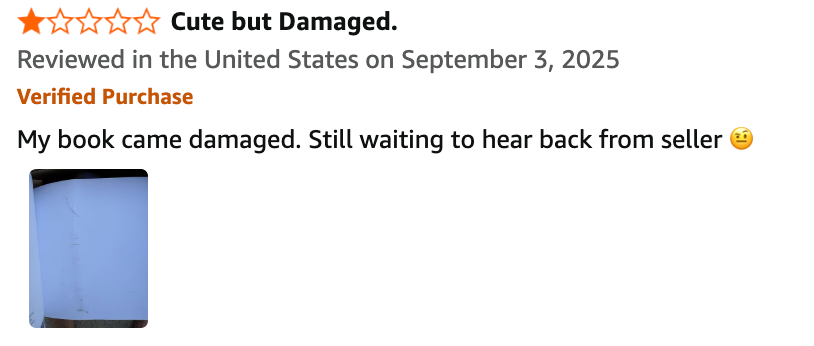 Review screenshot showing 2-star rating, 'Cute but Damaged' title, and photo of a damaged book corner